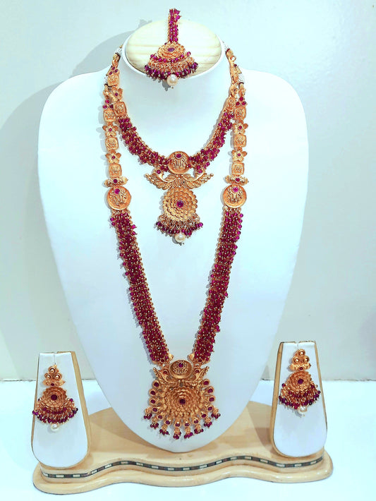 Yakshami Bridal jewellery set- golden necklace, choker, maang tikaand and drop earringsf with purple mani for women and girls